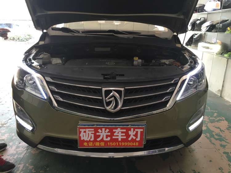 宝骏560原厂大灯广西彤明车灯,宝骏560改led双光透镜路面效果