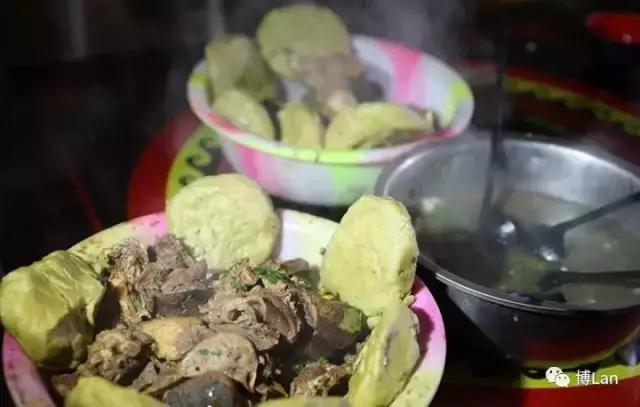 彝族特色菜肴坨坨肉图片,彝族特色酒