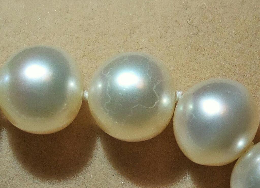 珍珠打孔处像有脱皮怎么回事,珍珠脱皮了怎么补救