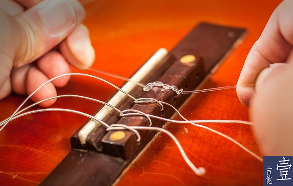 北航吉他,如何换吉他新弦