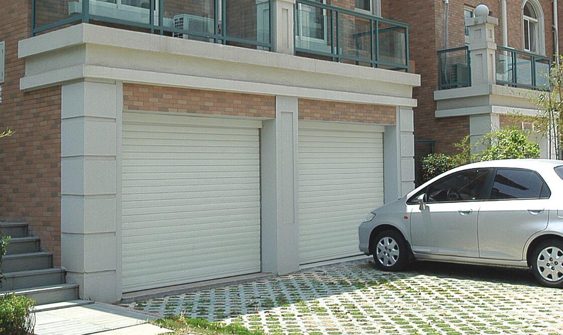 电动车库门和手动门哪个好,车库门用卷帘门好还是不锈钢门好