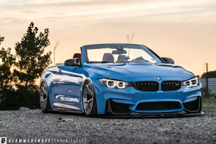 改装的宝马m4直接趴在地上了,普通的宝马m4可以开敞篷