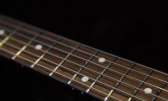 吉他乌木属于什么木种,吉他有木纹就是真木头吗