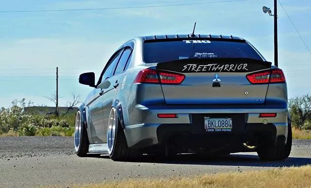 三菱evo对比翼神evo,三菱翼神改evo多少钱