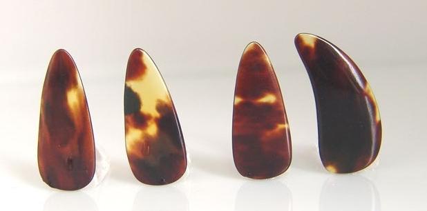 古筝指甲的鉴别方法,古筝义甲穿山甲和玳瑁哪个好