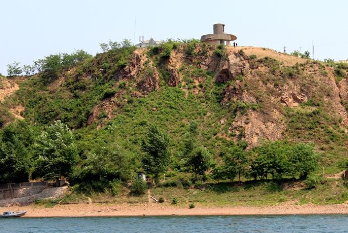 中朝边境美丽的风景,中朝边境桃花盛开的地方