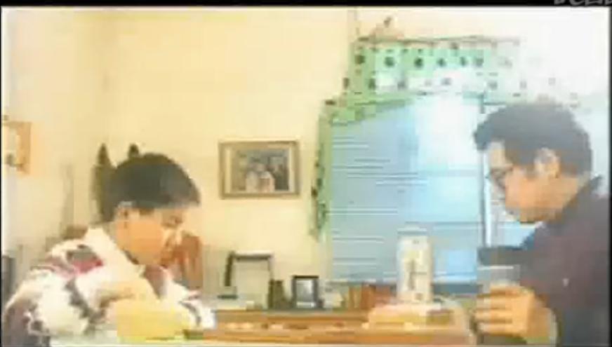 古力小时候学棋故事,围棋古力年轻的照片