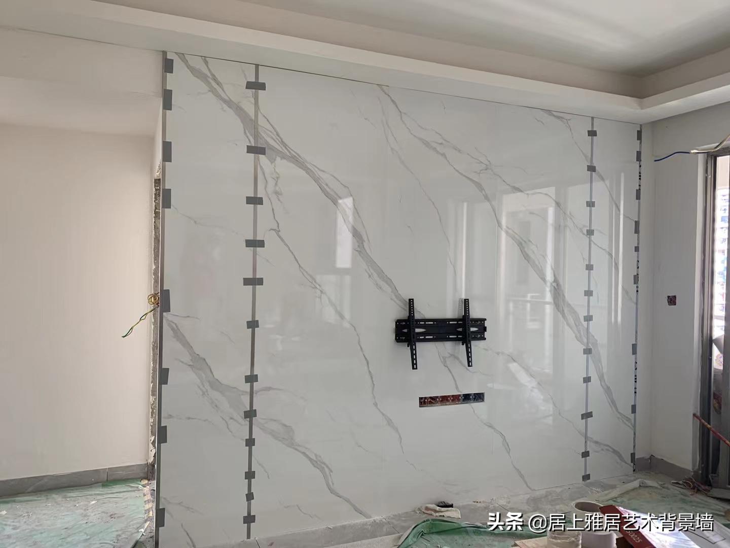 电视背景墙是岩板好还是大理石好,岩板电视背景墙价格多少钱一平米