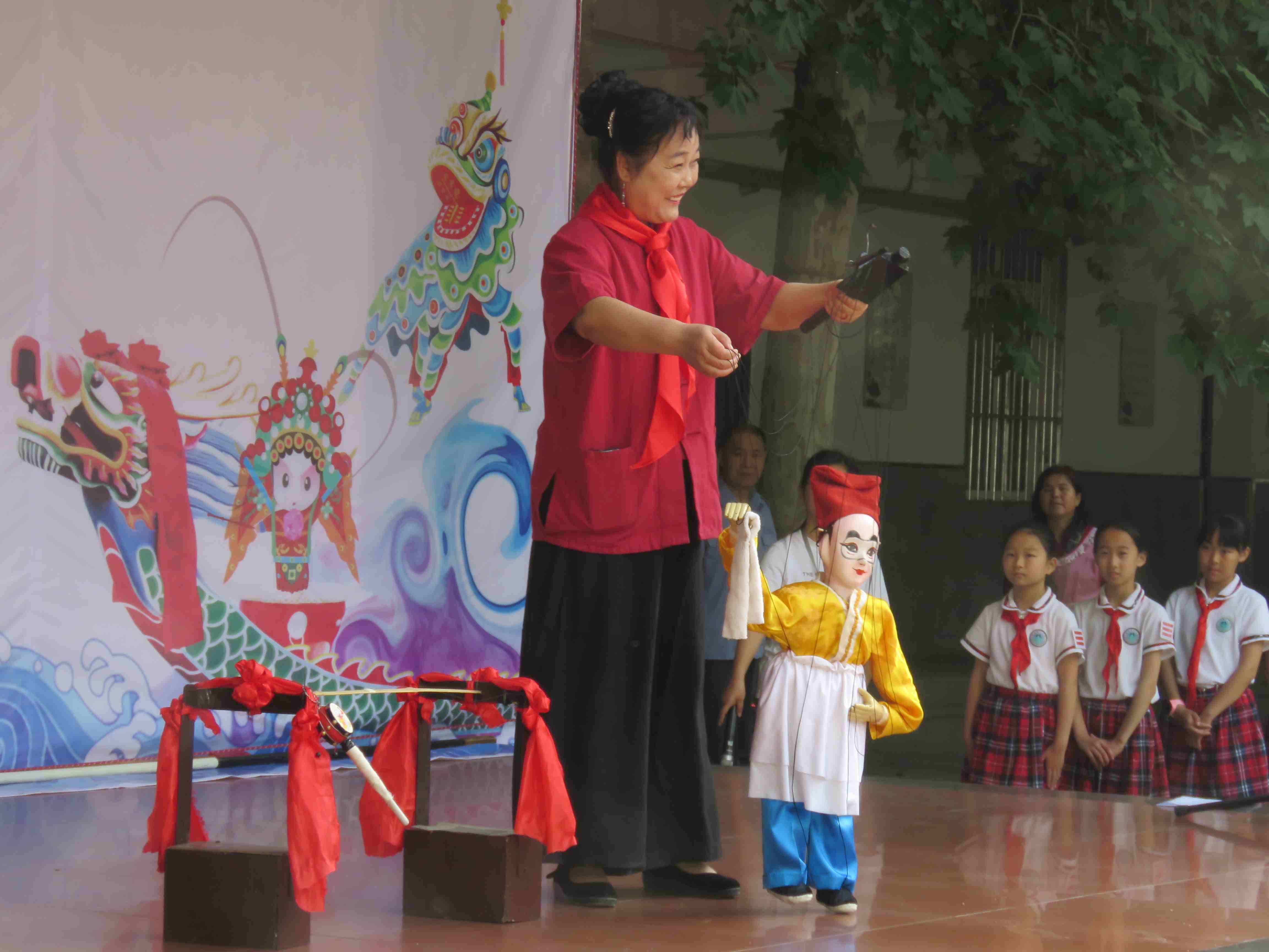 陕西非遗联盟把传统技艺带进校园学生们开心迎六一