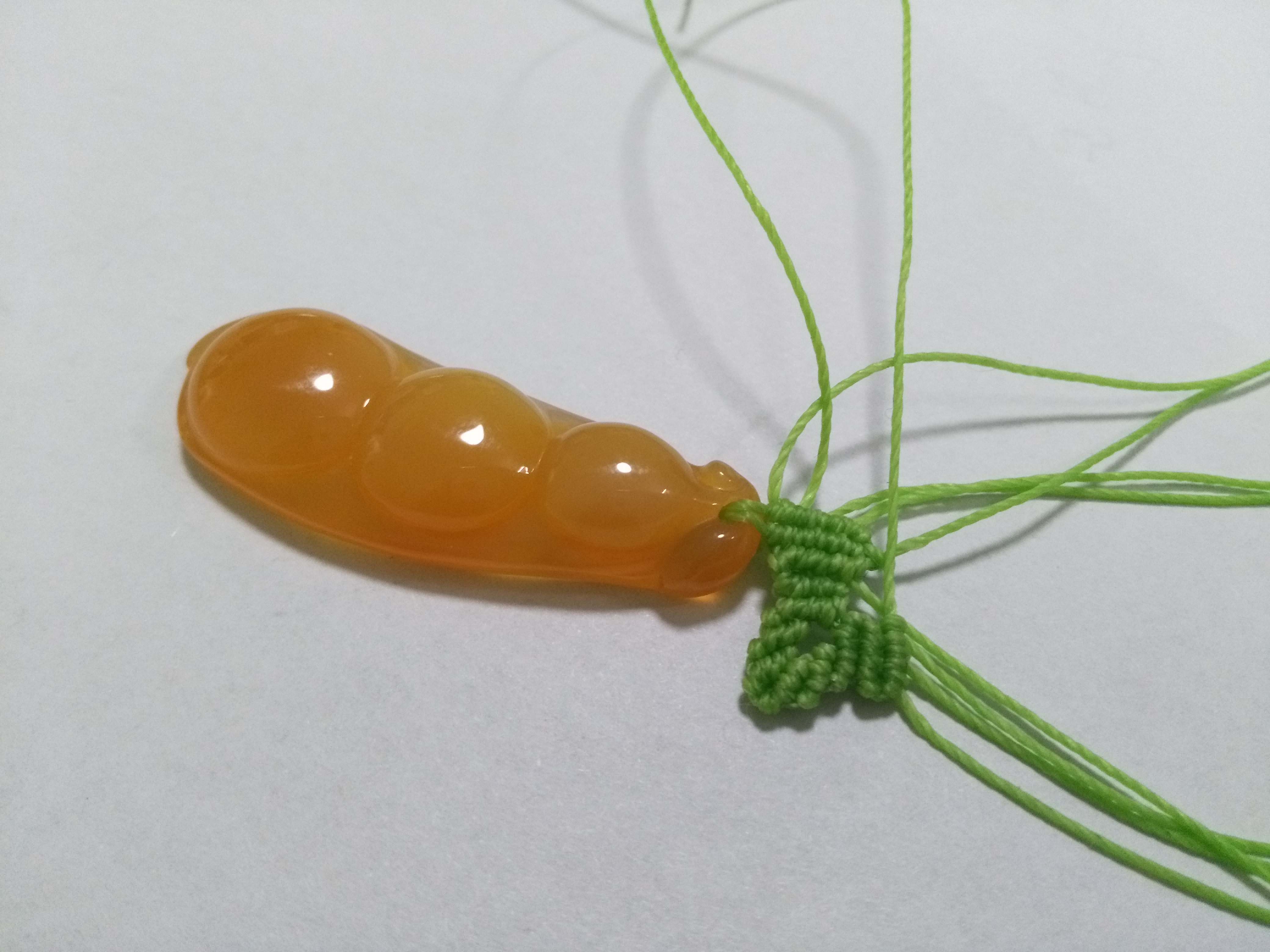 玛瑙豆子编手机吊坠法教程,玉豌豆吊坠怎么编绳