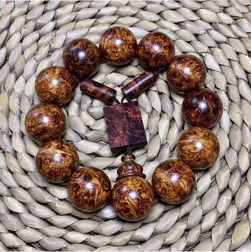 爱木人的名片——《佛珠》