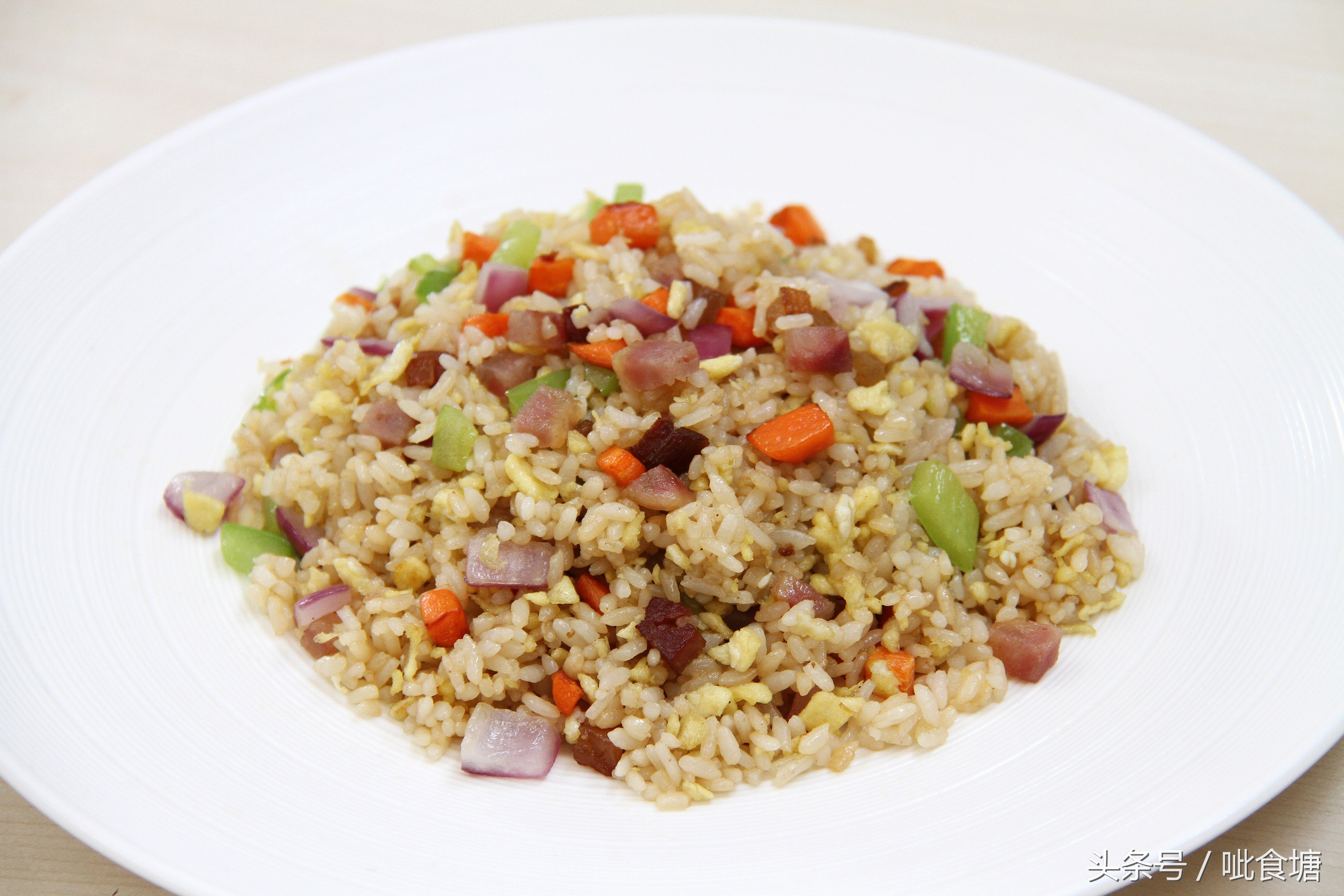 炒饭如何做到米粒松散不硬,炒饭太干硬