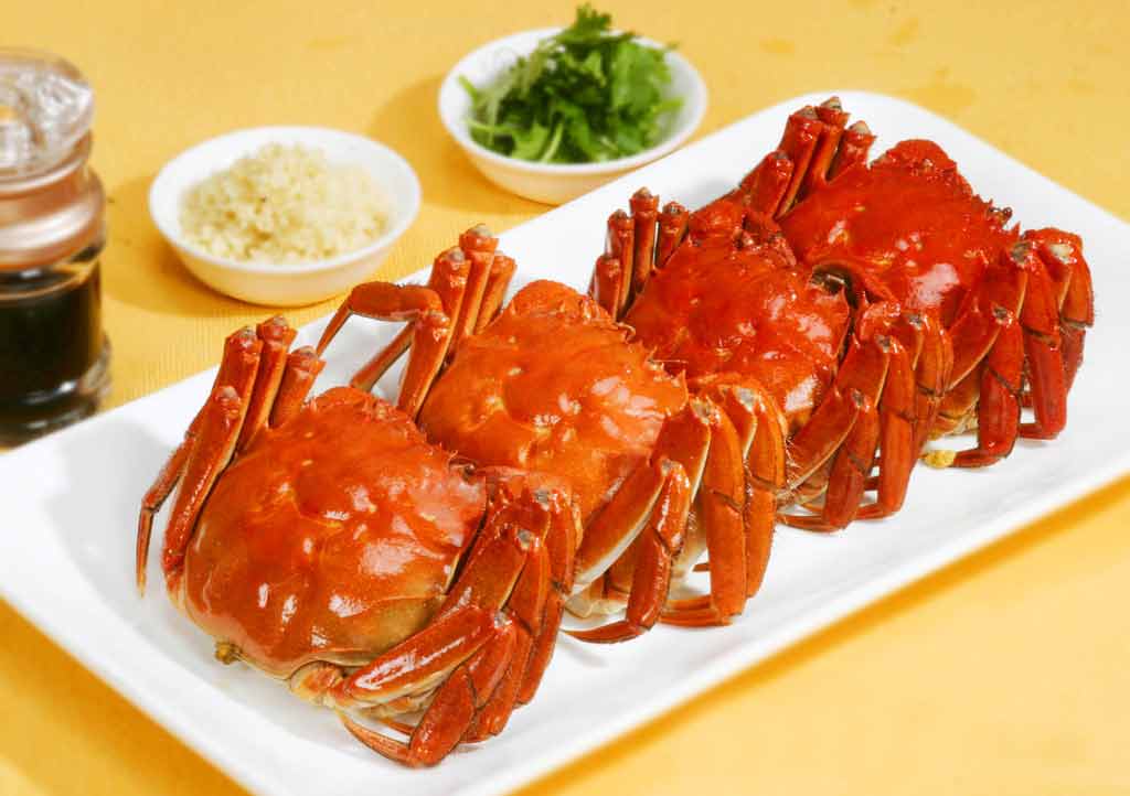 柿子和蟹中毒后果,柿子与海鲜同食有什么危害