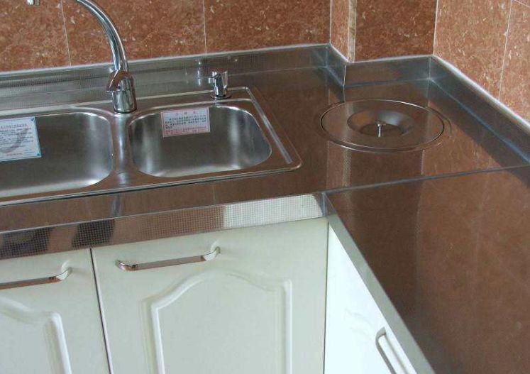 人造石橱柜好还是不锈钢橱柜好,灶台是不锈钢好还是人造石好