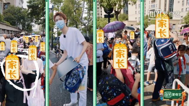 家长应该给孩子背书包吗,家长就应该帮孩子背书包