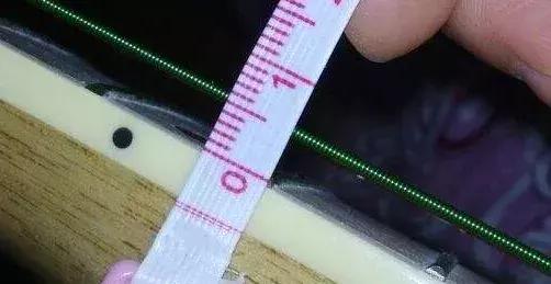 没有琴颈调节的吉他怎样调整弦距,38寸和41寸吉他弦距一样吗