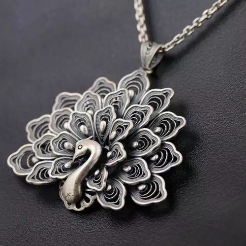 怎么辨别纯银的真假最直接的办法,鉴别纯银项链银吊坠