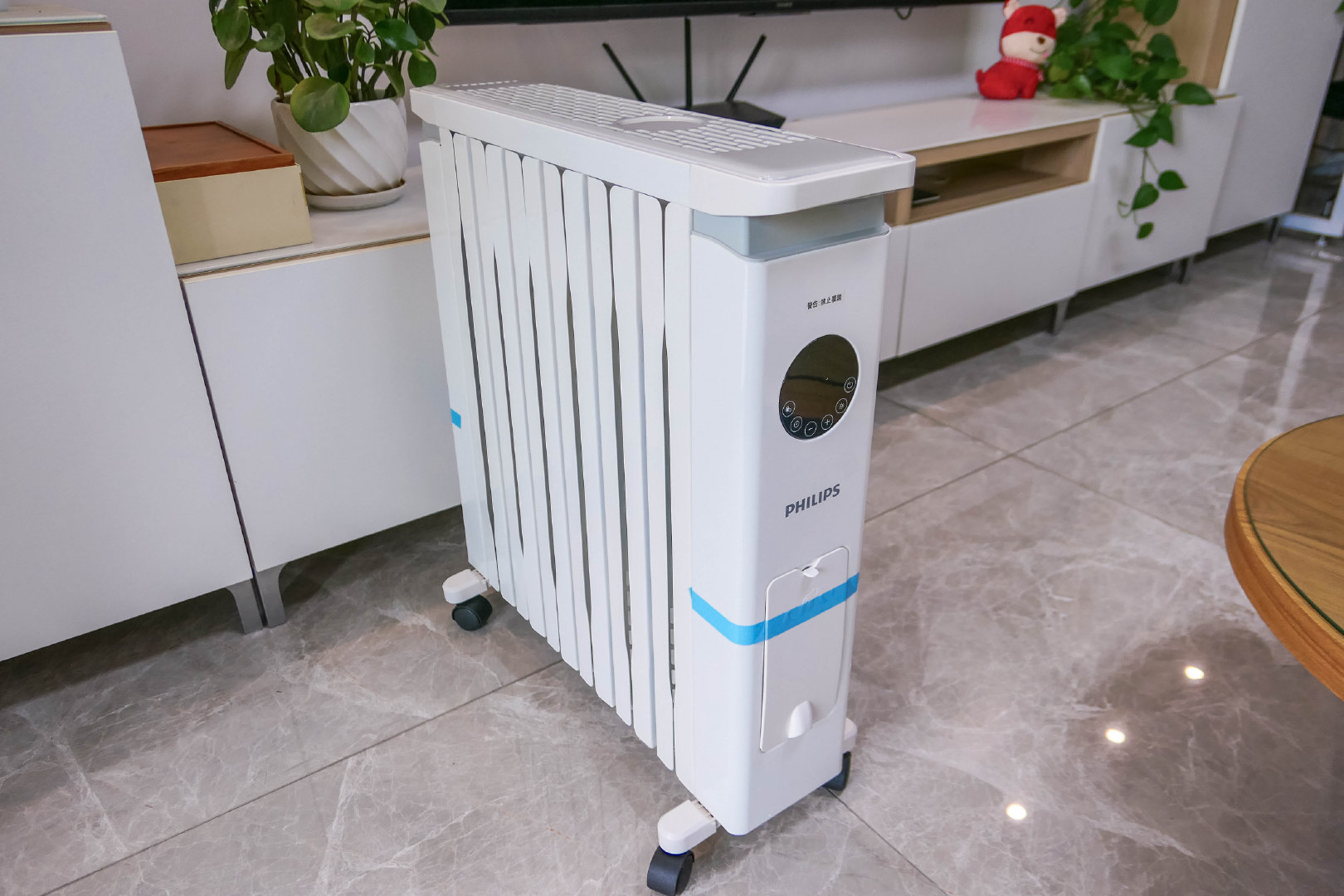 取暖器哪种油汀最好,取暖器用暖风机好还是快热炉好