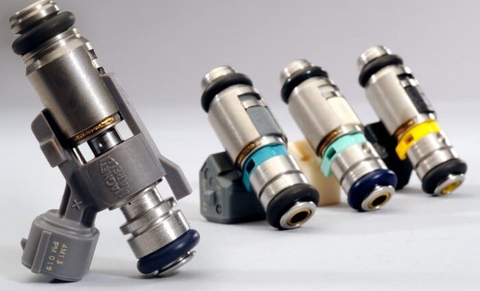 清洗喷油嘴和清洗积碳是一回事吗,发动机喷油嘴有必要清洗吗