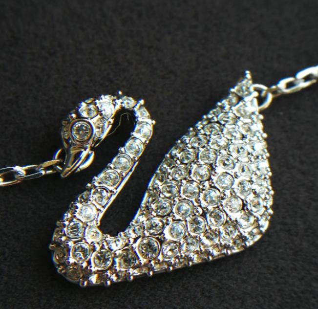 施华洛世奇粉晶天鹅手链真假辨别,施华洛世奇infinity手环鉴别真假