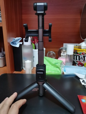 华为有线自拍杆的使用方法及操作,华为手机用自拍杆的使用方法图解