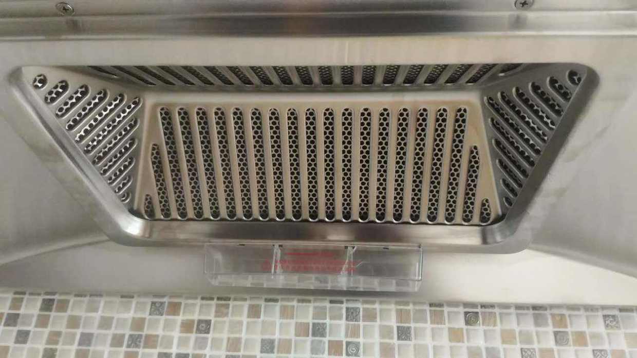 油烟机过滤网的清理,油烟机的过滤网怎么清洗方便