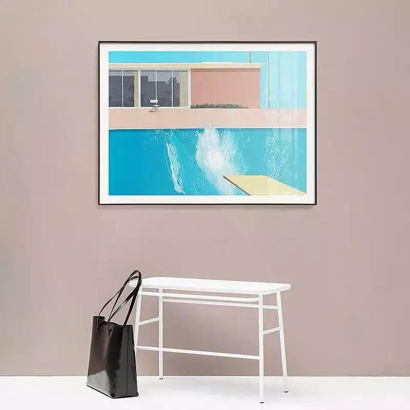 客厅里挂结婚照好不好,结婚照挂在客厅的沙发上面好吗