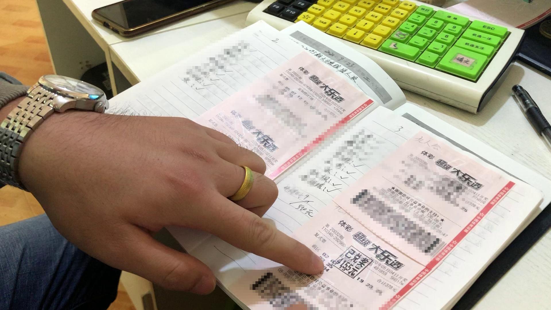 彩票站一天卖20000一年挣多少钱,一个彩票店一年能挣多少