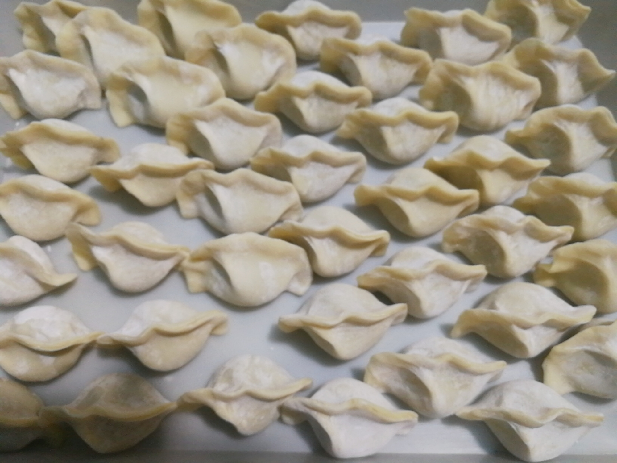 速冻饺子煮不熟发白,速冻饺子皮发白煮不熟