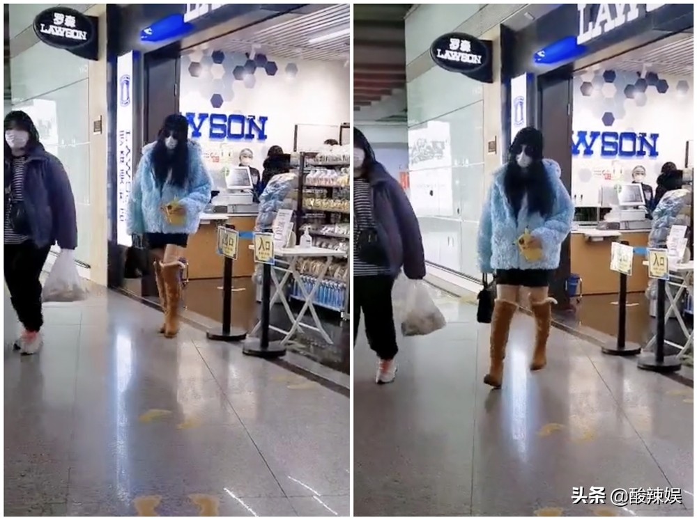 范冰冰现身机场穿牛仔裤,范冰冰穿羽绒服机场秀