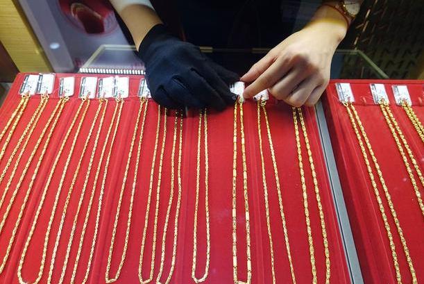 黄金戒指戴了颜色变淡了,黄金首饰价格会随着金价变化吗