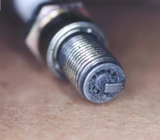 更换火花塞质保终身,火花塞一定要换原厂的吗