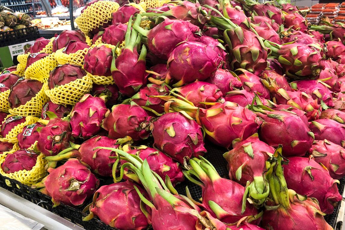 买火龙果黄心,买火龙果是买红色的还是白色的