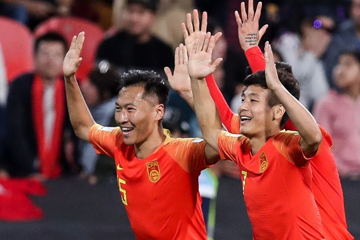 足球中的微笑瞬间,中国足球的泪水