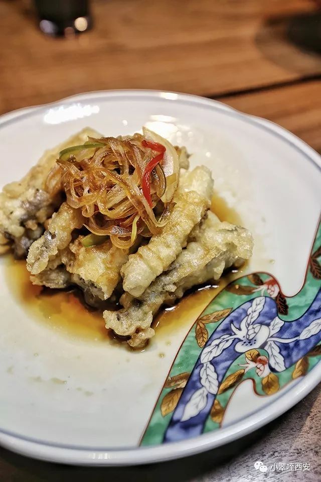 初春的西影厂，是那棵法国梧桐树下的日料店