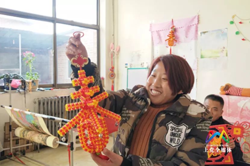 【同行小康路】张燕：巧手串出多彩生活