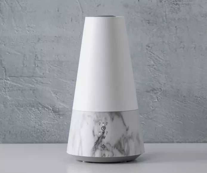 像艺术品的香薰加湿器，智能调节温度和雾量