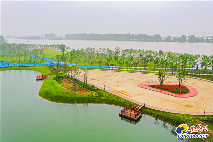 以绿护绿绘画,以绿为笔勾勒生态宜居新画卷