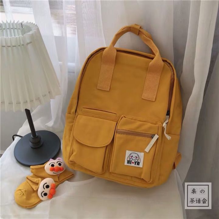 黑色抽绳双肩包出街百搭,双肩包出街推荐大学生小巧