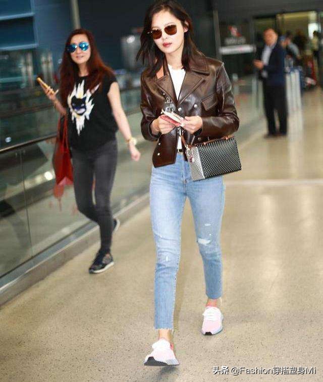 张钧甯皮衣机场照 (张钧甯身穿黑色皮衣)