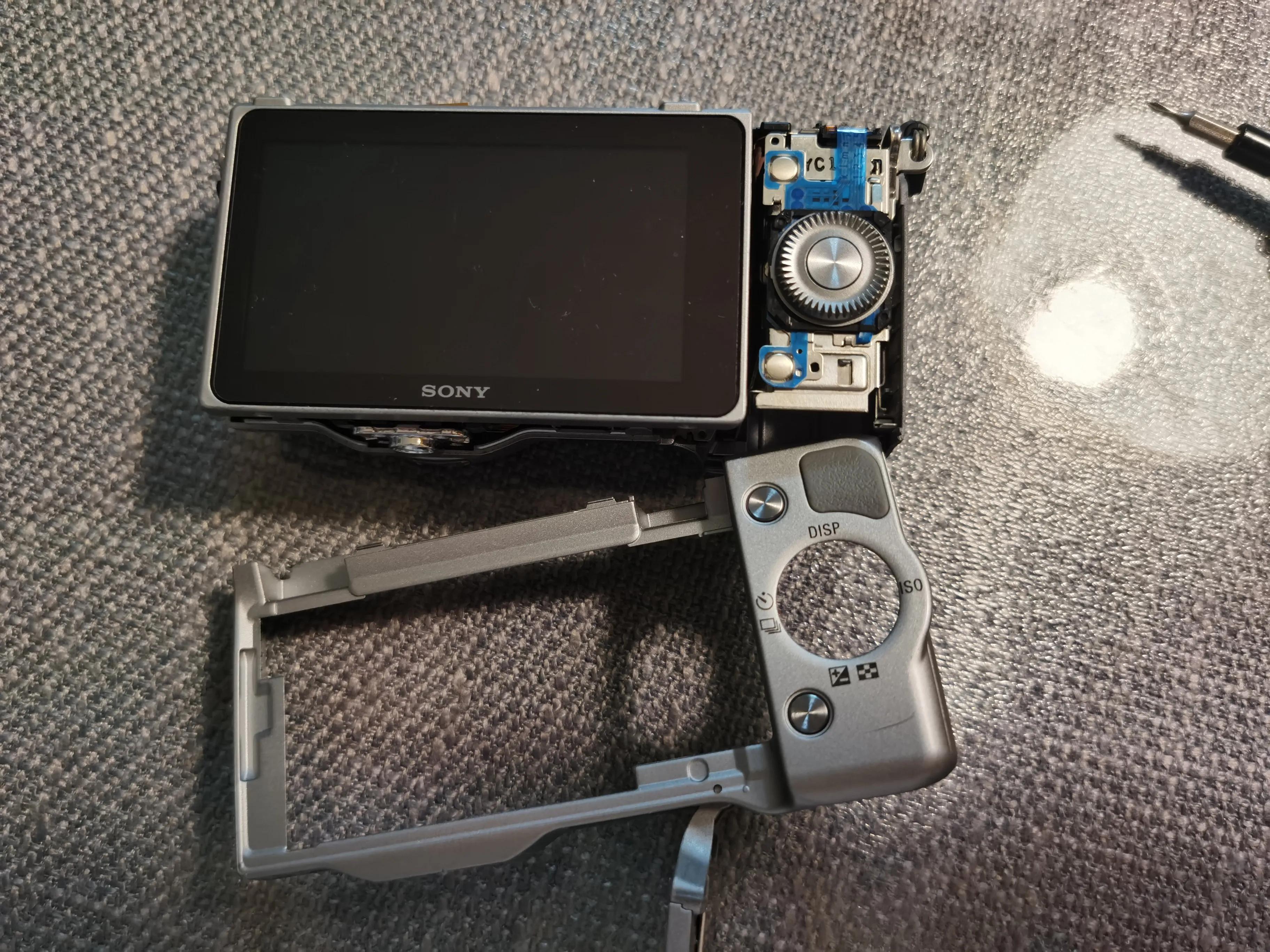 索尼相机更换快门组件,索尼微单相机电池盖拆卸教程