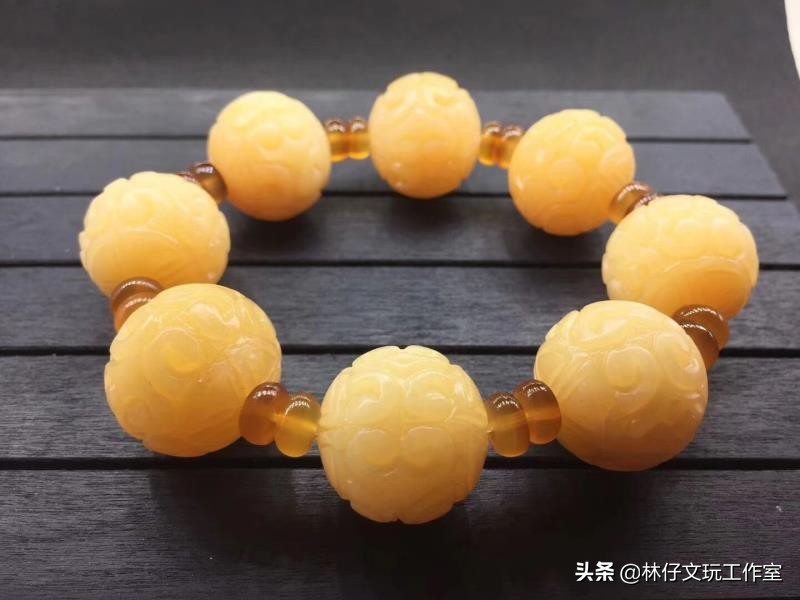 真假金丝砗磲对比照片,紫光灯照白砗磲的真假鉴别