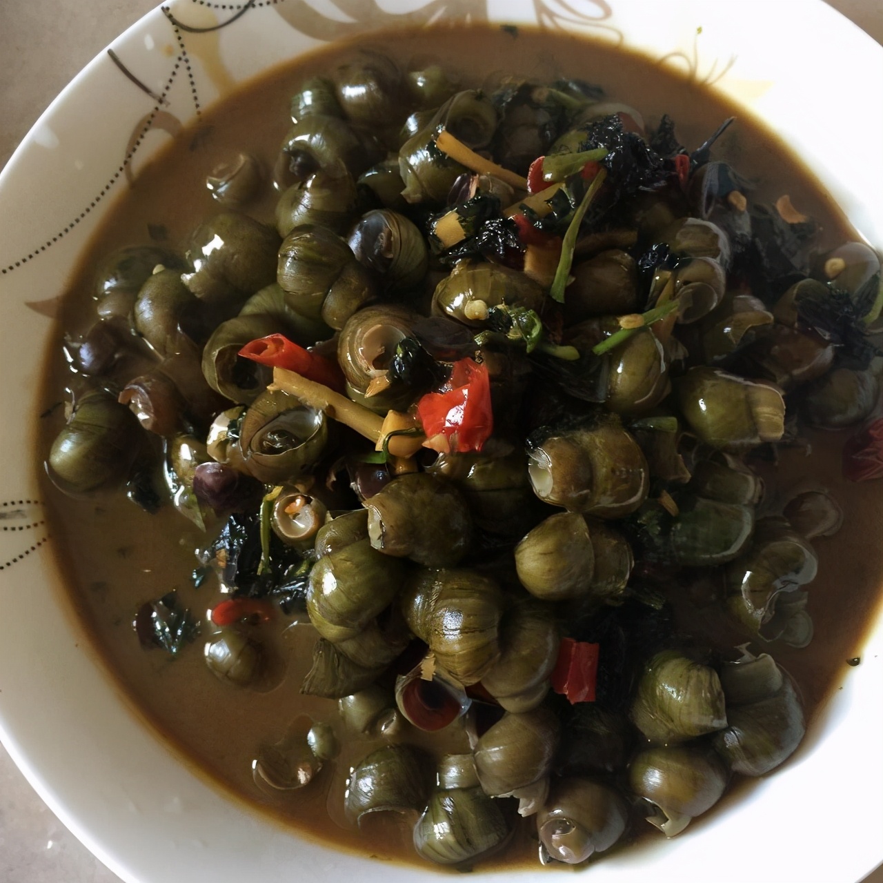 田螺屁股的处理方法,没剪屁股的田螺怎么处理