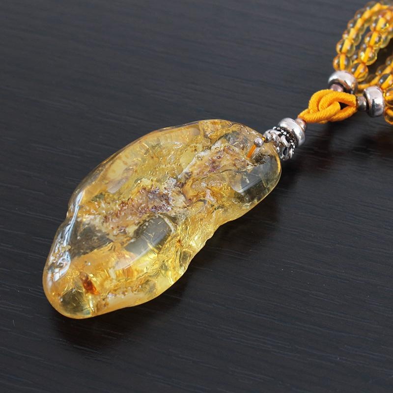 假蜜蜡是什么材料做成的,假蜜蜡和真蜜蜡有什么区别