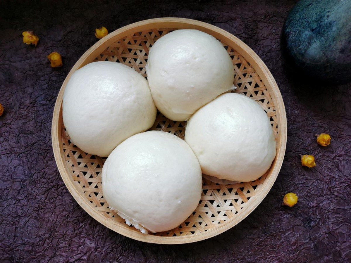 馒头出现塌皮褶皱是怎么回事,做馒头会开裂是什么意思