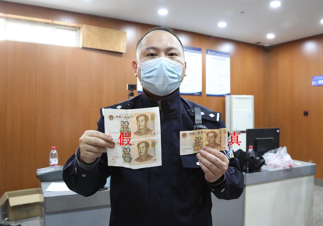 男子制作假币骗过验钞机,男子造假币以假乱真骗过验钞机