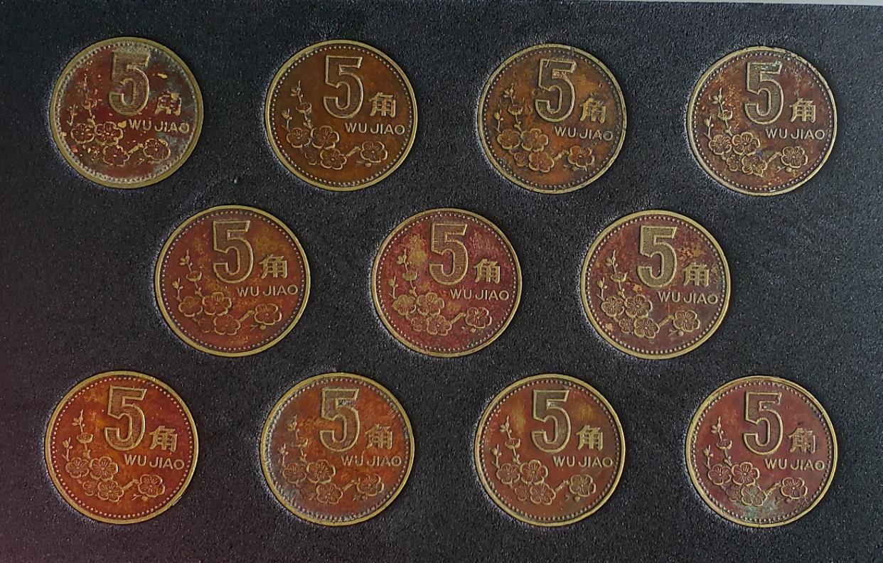 1998年梅花五角整卷币价值,2024年梅花五角原卷价格表