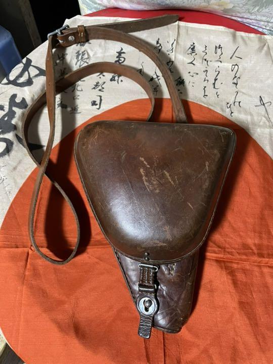 自杀都费劲的枪！日本手枪界的卧龙凤雏，南部十四式和他的兄弟