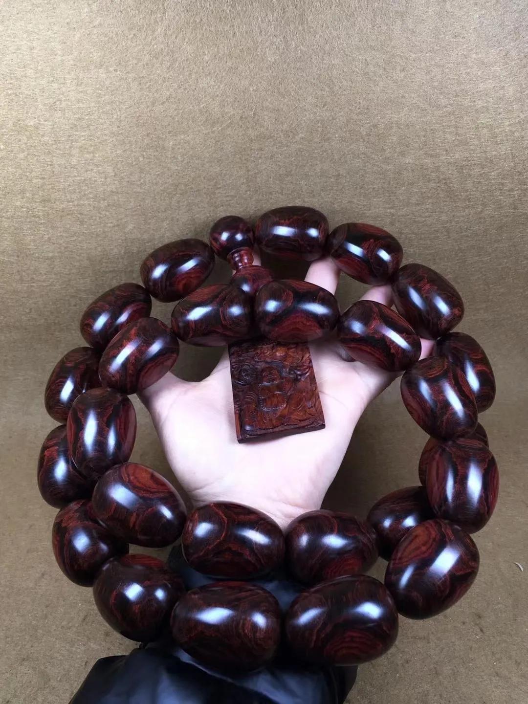 顶级海南黄花梨鬼脸手串,海南黄花梨手串一串多少克