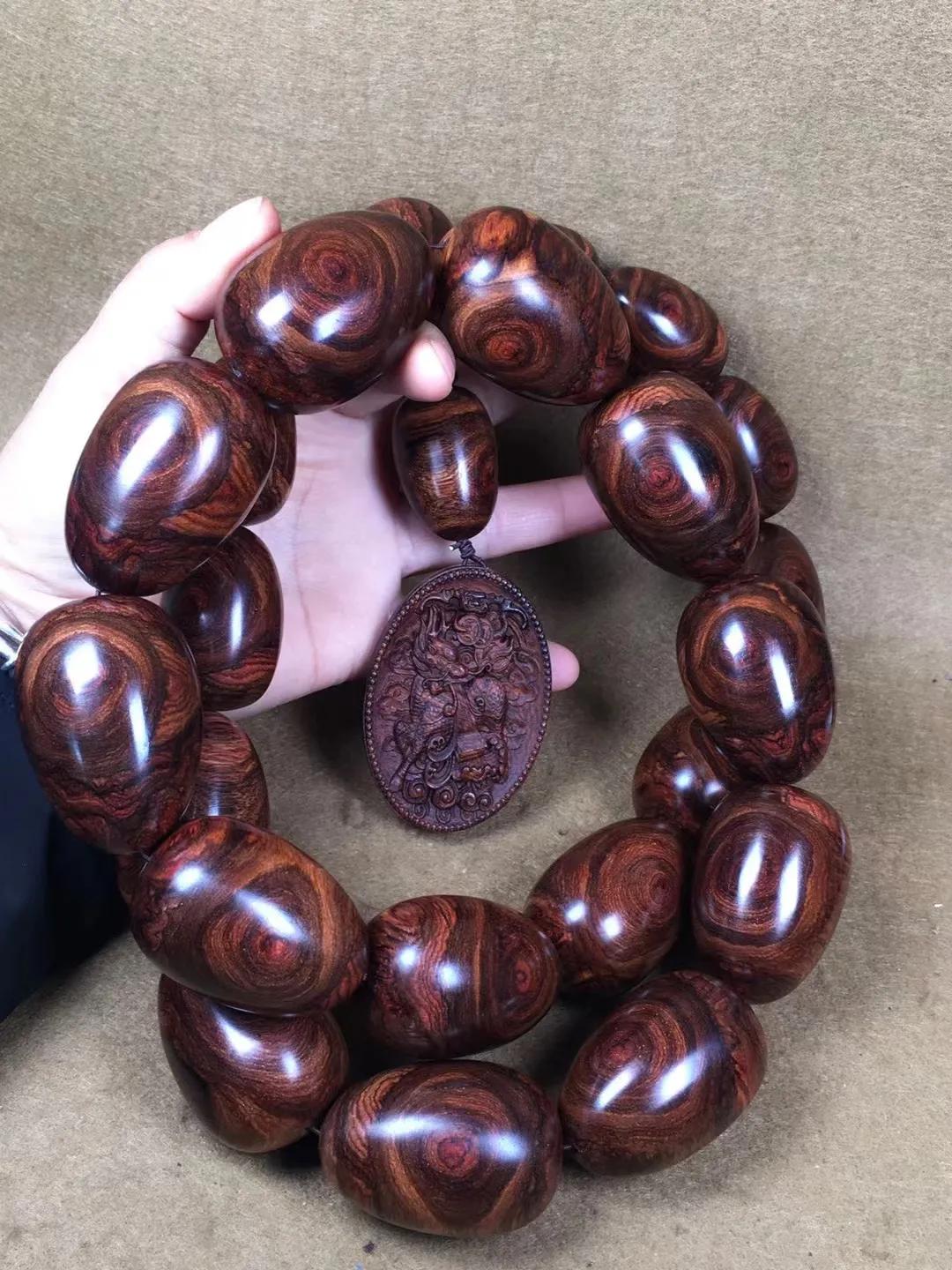 几百块一串的海南黄花梨手串,1.0的108串海南黄花梨手串配饰图片